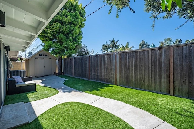 3109 Pattiz Ave, Long Beach, CA 90808 - view of yard with a storage unit, central AC unit, and an outbuilding