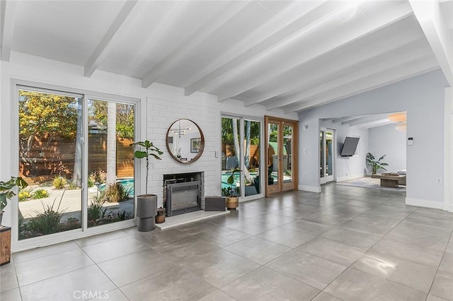 3109 Pattiz Ave, Long Beach, CA 90808 - unfurnished living room with a fireplace, baseboards, and tile patterned floors