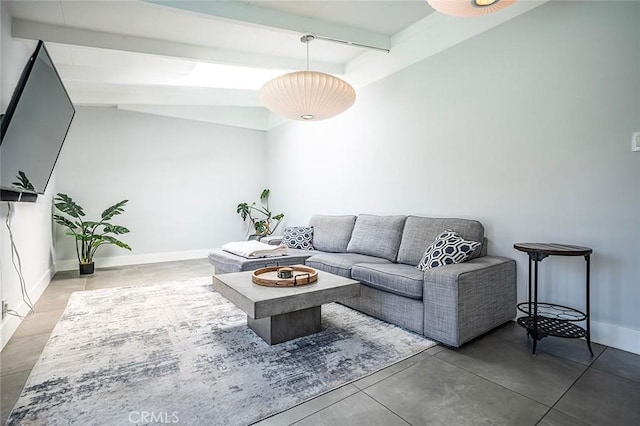 living room with baseboards and vaulted ceiling with beams