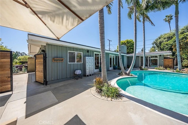 outdoor pool featuring a patio area