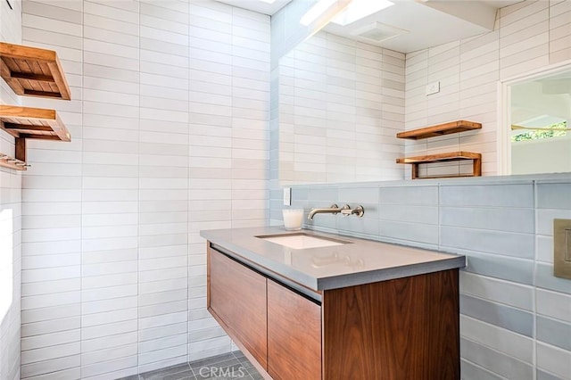 3109 Pattiz Ave, Long Beach, CA 90808 - bathroom featuring tile walls and vanity