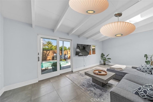 tiled living room with vaulted ceiling with beams and baseboards