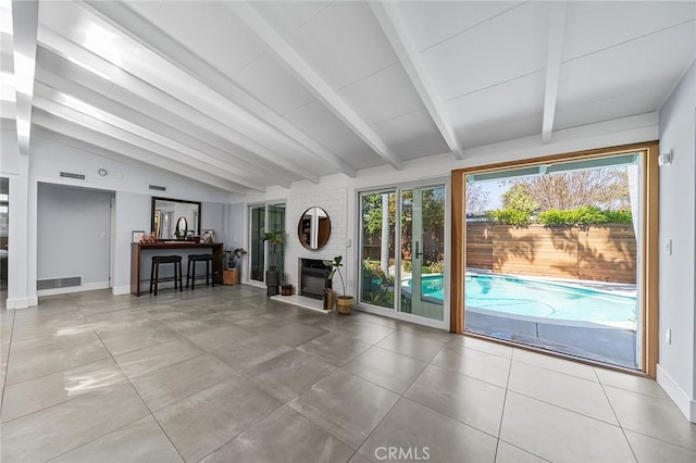3109 Pattiz Ave, Long Beach, CA 90808 - unfurnished living room with baseboards, a large fireplace, and tile patterned floors