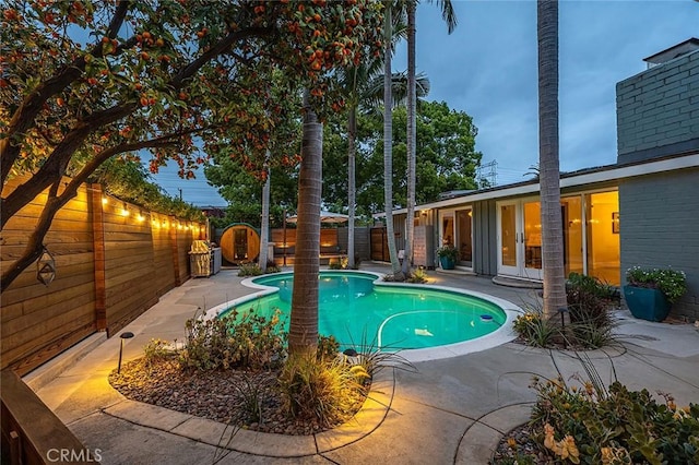 3109 Pattiz Ave, Long Beach, CA 90808 - view of swimming pool featuring french doors, a fenced backyard, and a patio area