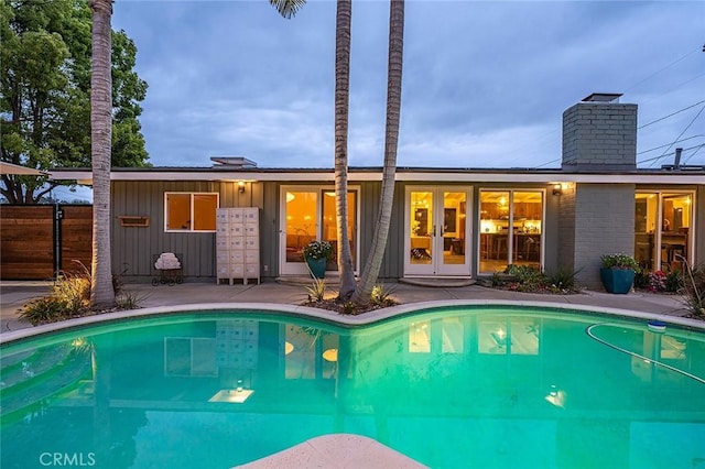 3109 Pattiz Ave, Long Beach, CA 90808 - view of swimming pool with french doors, fence, and mail area