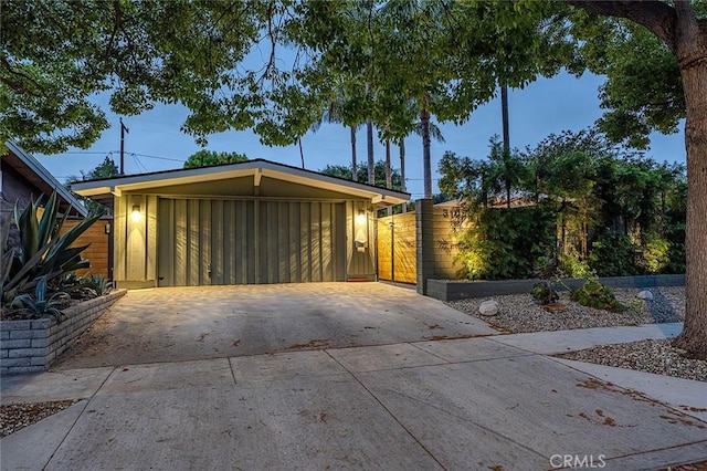 3109 Pattiz Ave, Long Beach, CA 90808 - garage featuring concrete driveway and a carport