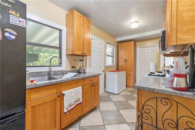 27 E Platt St, Long Beach, CA 90805 - kitchen with freestanding refrigerator, a sink, fridge, and healthy amount of natural light
