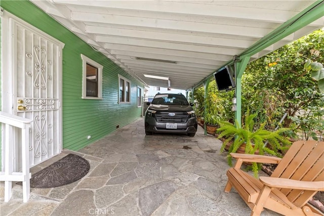 27 E Platt St, Long Beach, CA 90805 - view of patio / terrace with an attached carport