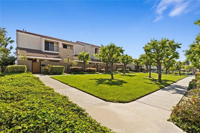 6279 Lincoln Ave, Buena Park, CA 90620 - view of property's community featuring a fenced front yard, a residential view, and a gate