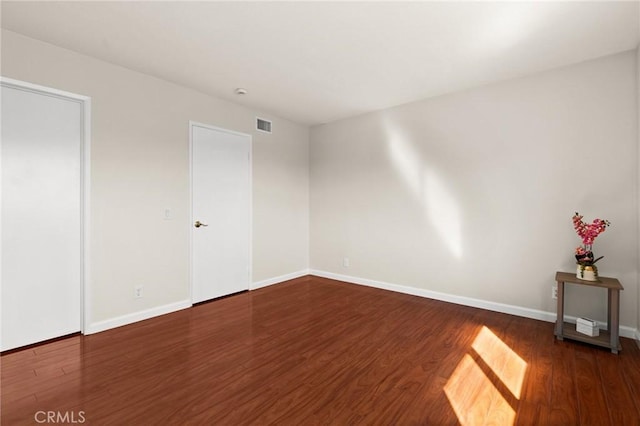 6279 Lincoln Ave, Buena Park, CA 90620 - empty room featuring wood finished floors and baseboards