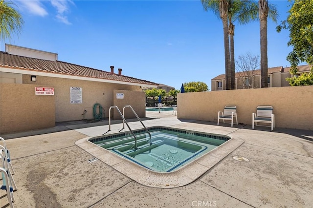 6279 Lincoln Ave, Buena Park, CA 90620 - view of pool featuring a community hot tub and a patio