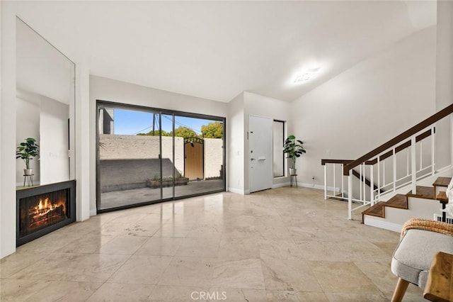 6279 Lincoln Ave, Buena Park, CA 90620 - foyer entrance with stairway and a lit fireplace