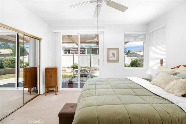 5775 Myrtle Beach Dr, Banning, CA 92220 - bedroom with access to outside, carpet flooring, and a ceiling fan