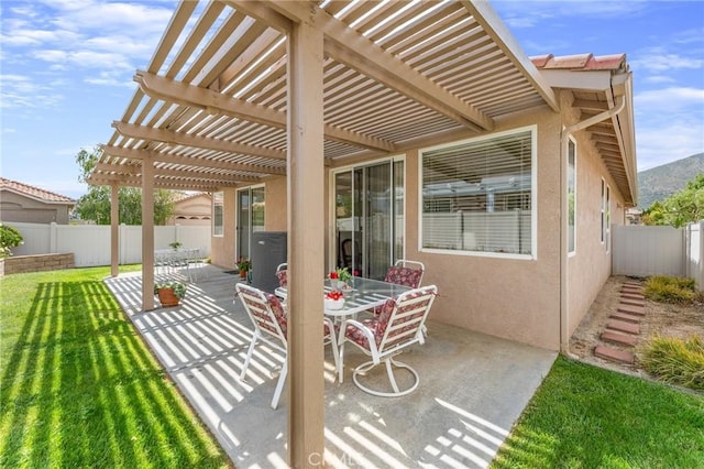 5775 Myrtle Beach Dr, Banning, CA 92220 - view of patio featuring a pergola and outdoor dining space