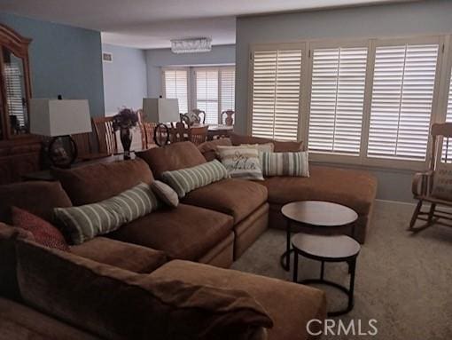 living area with carpet floors