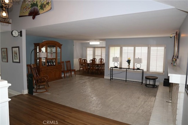 interior space featuring baseboards