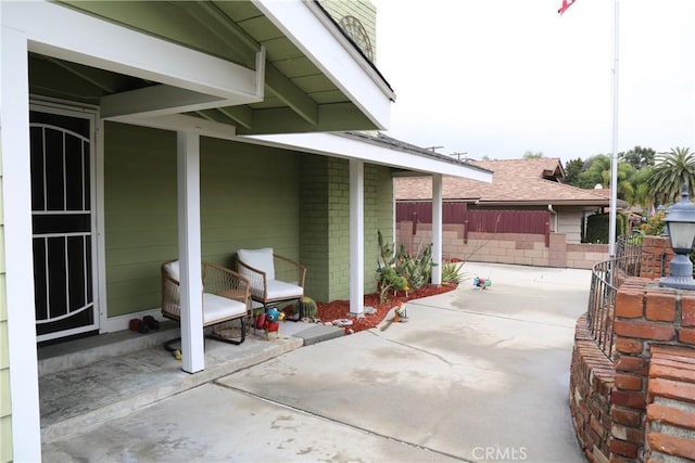 view of patio with fence