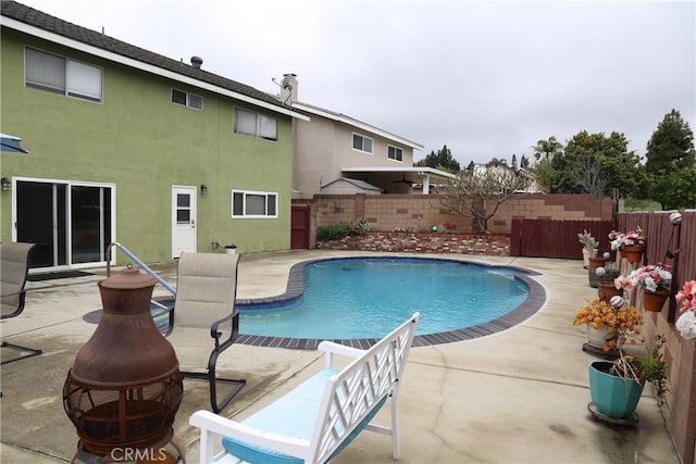 view of pool with a fenced backyard, a patio area, and a fenced in pool