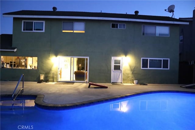 18137 Galatina St, Rowland Heights, CA 91748 - rear view of property with a patio, an outdoor pool, and stucco siding