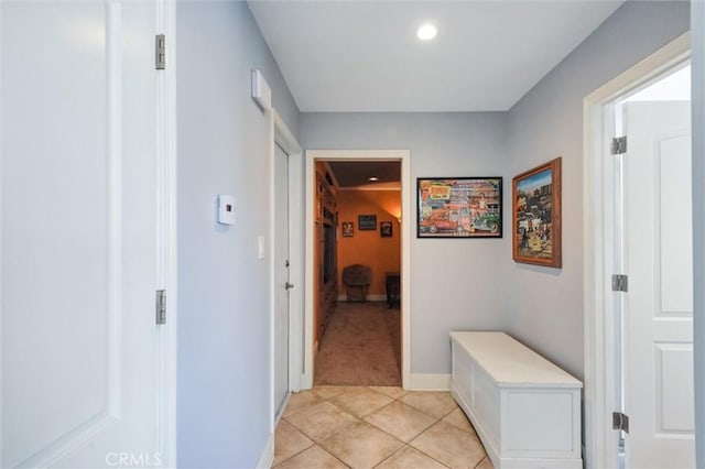 18137 Galatina St, Rowland Heights, CA 91748 - corridor featuring light tile patterned floors, light colored carpet, and recessed lighting