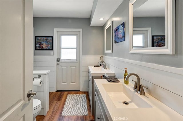 18137 Galatina St, Rowland Heights, CA 91748 - bathroom with wood finished floors, wainscoting, and vanity