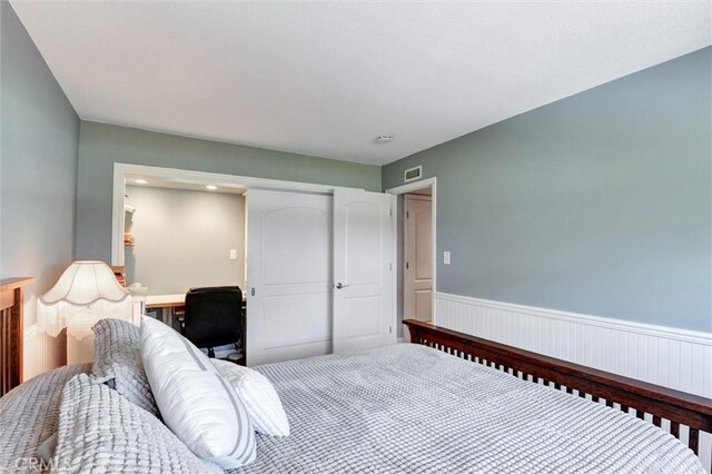 18137 Galatina St, Rowland Heights, CA 91748 - bedroom featuring wainscoting, a closet, and recessed lighting