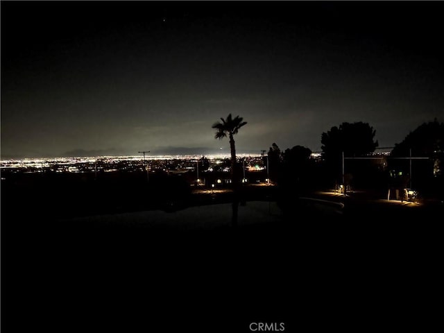 13827 Olathe Rd, Apple Valley, CA 92307 - view of yard at night