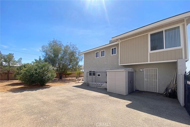 13827 Olathe Rd, Apple Valley, CA 92307 - rear view of house with fence