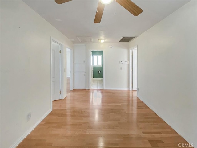 13827 Olathe Rd, Apple Valley, CA 92307 - unfurnished room with ceiling fan, light wood-style flooring, and baseboards
