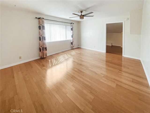 13827 Olathe Rd, Apple Valley, CA 92307 - unfurnished room featuring light wood-style flooring, ceiling fan, and baseboards