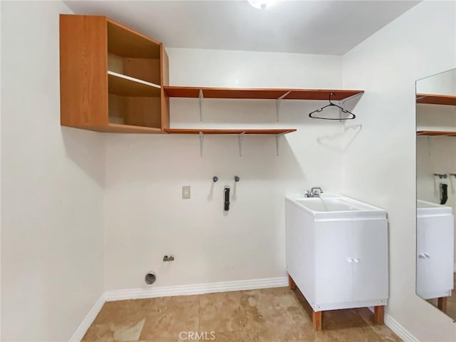13827 Olathe Rd, Apple Valley, CA 92307 - clothes washing area with washer hookup, gas dryer hookup, and baseboards
