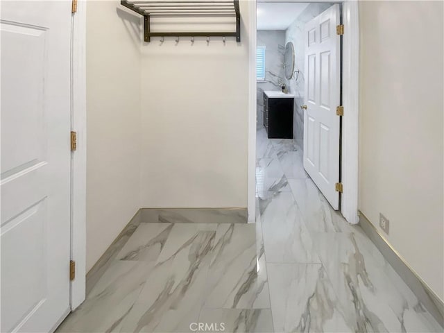 13827 Olathe Rd, Apple Valley, CA 92307 - mudroom with light marble finish flooring and baseboards