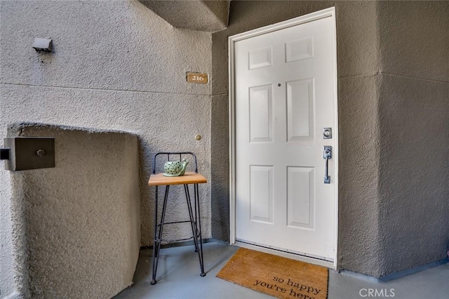 310 Lake St Unit 216, Huntington Beach, CA 92648 - view of exterior entry with stucco siding