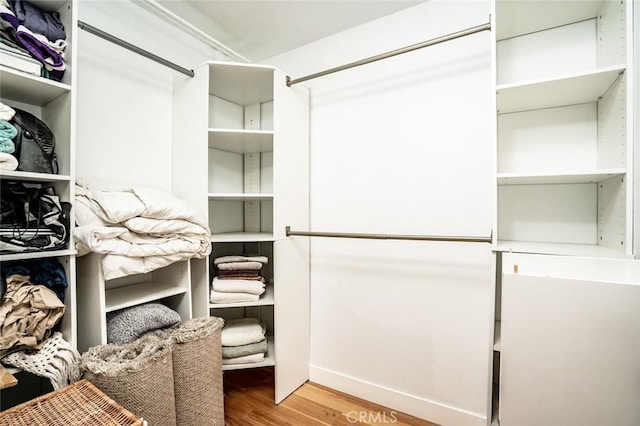 310 Lake St Unit 216, Huntington Beach, CA 92648 - spacious closet featuring wood finished floors