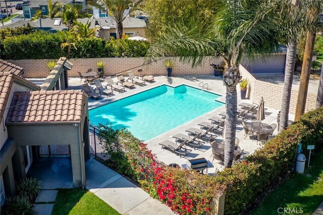 310 Lake St Unit 216, Huntington Beach, CA 92648 - pool with fence and a patio