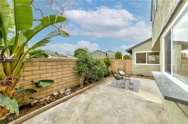 view of patio with a fenced backyard