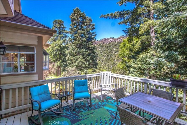 6180 Cedar Ave, Angelus Oaks, CA 92305 - deck with outdoor dining area