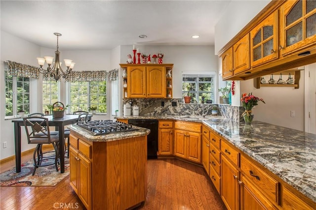 6180 Cedar Ave, Angelus Oaks, CA 92305 - kitchen featuring dishwasher, stainless steel gas cooktop, dark wood finished floors, a chandelier, and brown cabinets