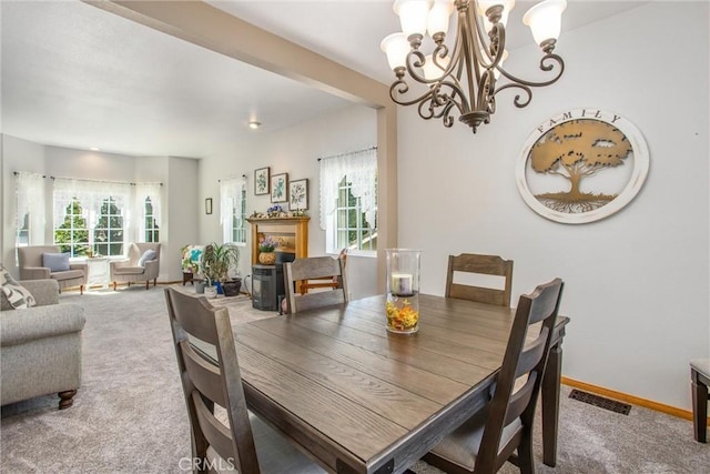 6180 Cedar Ave, Angelus Oaks, CA 92305 - dining space with carpet and a chandelier