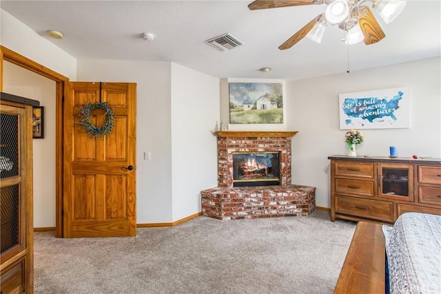 6180 Cedar Ave, Angelus Oaks, CA 92305 - living room with carpet, a ceiling fan, and a fireplace