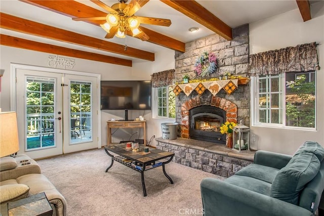 6180 Cedar Ave, Angelus Oaks, CA 92305 - living area featuring beam ceiling, carpet flooring, plenty of natural light, a ceiling fan, and french doors