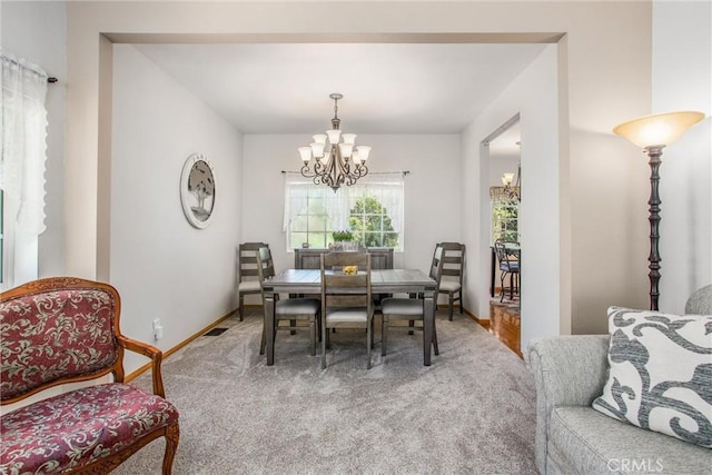 6180 Cedar Ave, Angelus Oaks, CA 92305 - dining space featuring a chandelier and light carpet