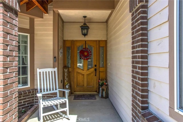 6180 Cedar Ave, Angelus Oaks, CA 92305 - doorway to property with a porch
