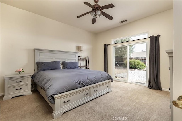 bedroom featuring light colored carpet, baseboards, access to exterior, ceiling fan, and visible vents