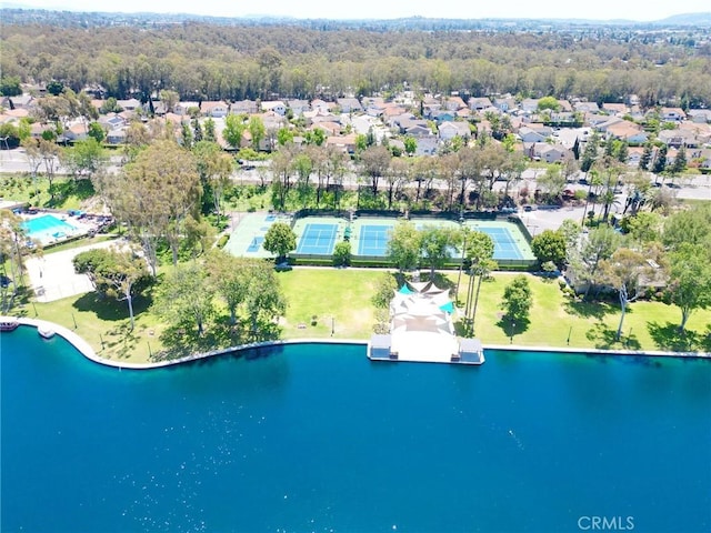 view of property location featuring nearby suburban area and a large body of water