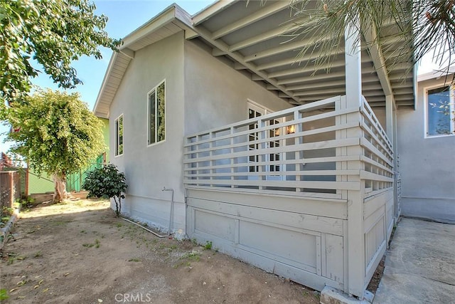 4026 Toland Way, Los Angeles, CA 90065 - view of side of home with stucco siding and fence