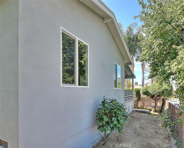 4026 Toland Way, Los Angeles, CA 90065 - view of home's exterior featuring fence and stucco siding