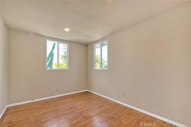 4026 Toland Way, Los Angeles, CA 90065 - spare room featuring baseboards, light wood-type flooring, and recessed lighting
