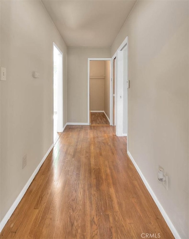 4026 Toland Way, Los Angeles, CA 90065 - corridor featuring wood finished floors and baseboards