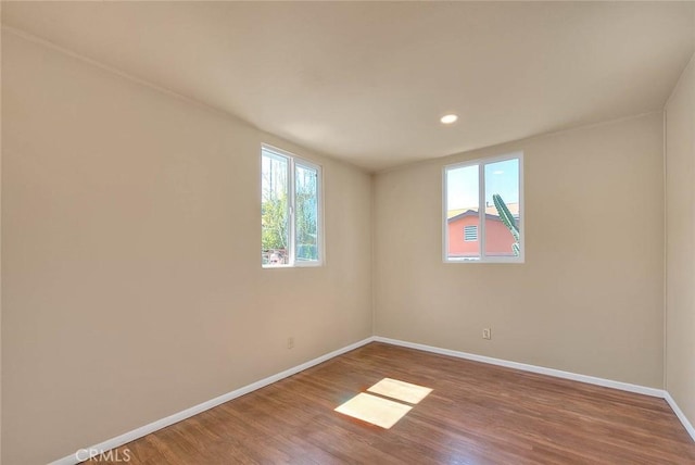 4026 Toland Way, Los Angeles, CA 90065 - spare room with baseboards, wood finished floors, and recessed lighting